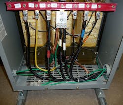 Photo 3. This separately derived system/transformer has a compliant system bonding jumper; however, the required grounding electrode conductor is absent.