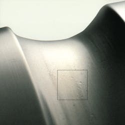 Photo 2b. Bearing fluting due to shaft currents (top) and grease contamination (bottom). Photo 2b. Bearing fluting due to shaft currents (top) and grease contamination (bottom).