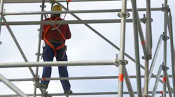 Man Standing on Scaffolding