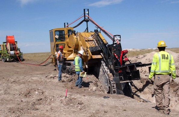 Installation of URD line for a wind farm collector system