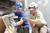 A Faith Technologies&rsquo; journeyman mentors a new employee on safety as a part of the company&rsquo;s Short Service Employee (SSE) program.