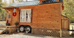 Denise Ryals, owner of Hummingbird Houses in Danville, Ga., lives in this tiny home with her husband. The house was featured on Tiny House Hunters and Tiny House, Big Living.