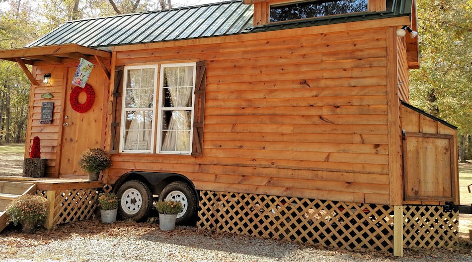 Denise Ryals, owner of Hummingbird Houses in Danville, Ga., lives in this tiny home with her husband. The house was featured on Tiny House Hunters and Tiny House, Big Living.