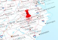 Red Thumbtack Over North Carolina State USA Map. 3D rendering