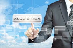 man in suit pointing at acquisition sign man in suit pointing at acquisition sign