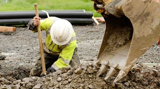 construction-worker-digging-trench.jpg