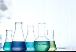chemicals in beakers chemicals in beakers