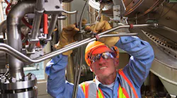 engineer repairing plant equipment