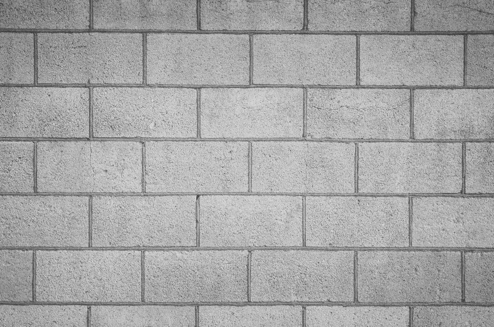 NEC Quiz No 114 Promo Image Concrete Block Wall