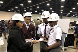 IEC coordinator Delast Muhammad with students IEC coordinator Delast Muhammad with students