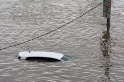 car submerged in flood waters car submerged in flood waters