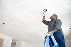electrician installing lighting electrician installing lighting