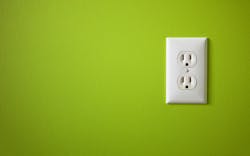 electrical power outlet on green background electrical power outlet on green background