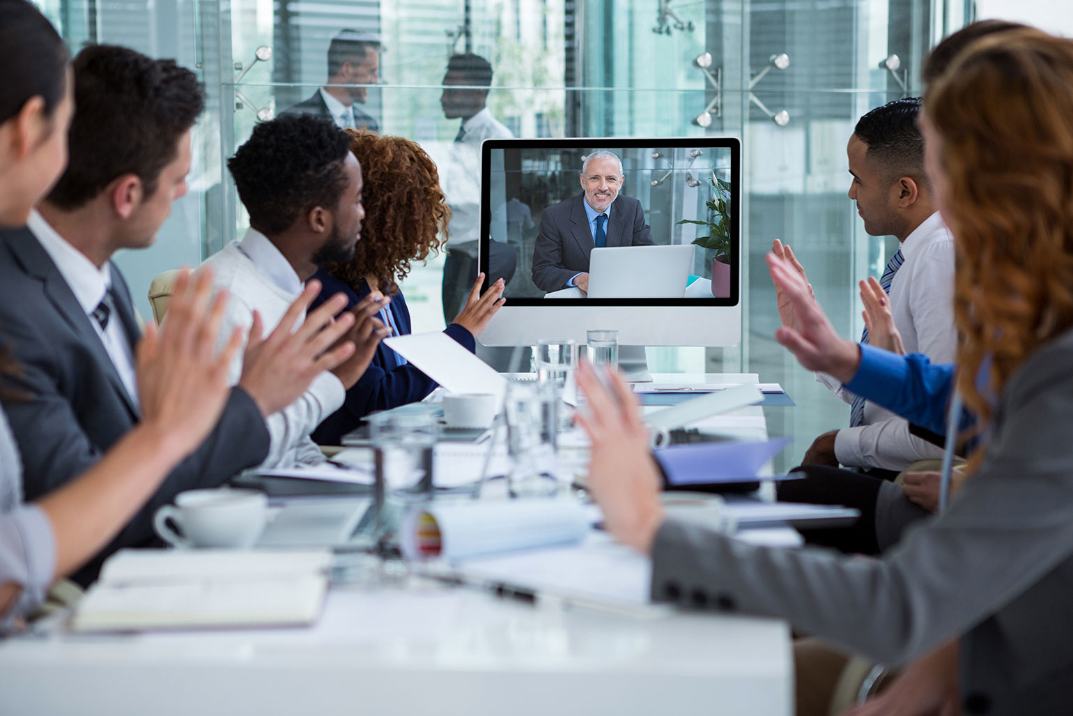 group of business people videoconferencing