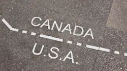 USA Canada border sign