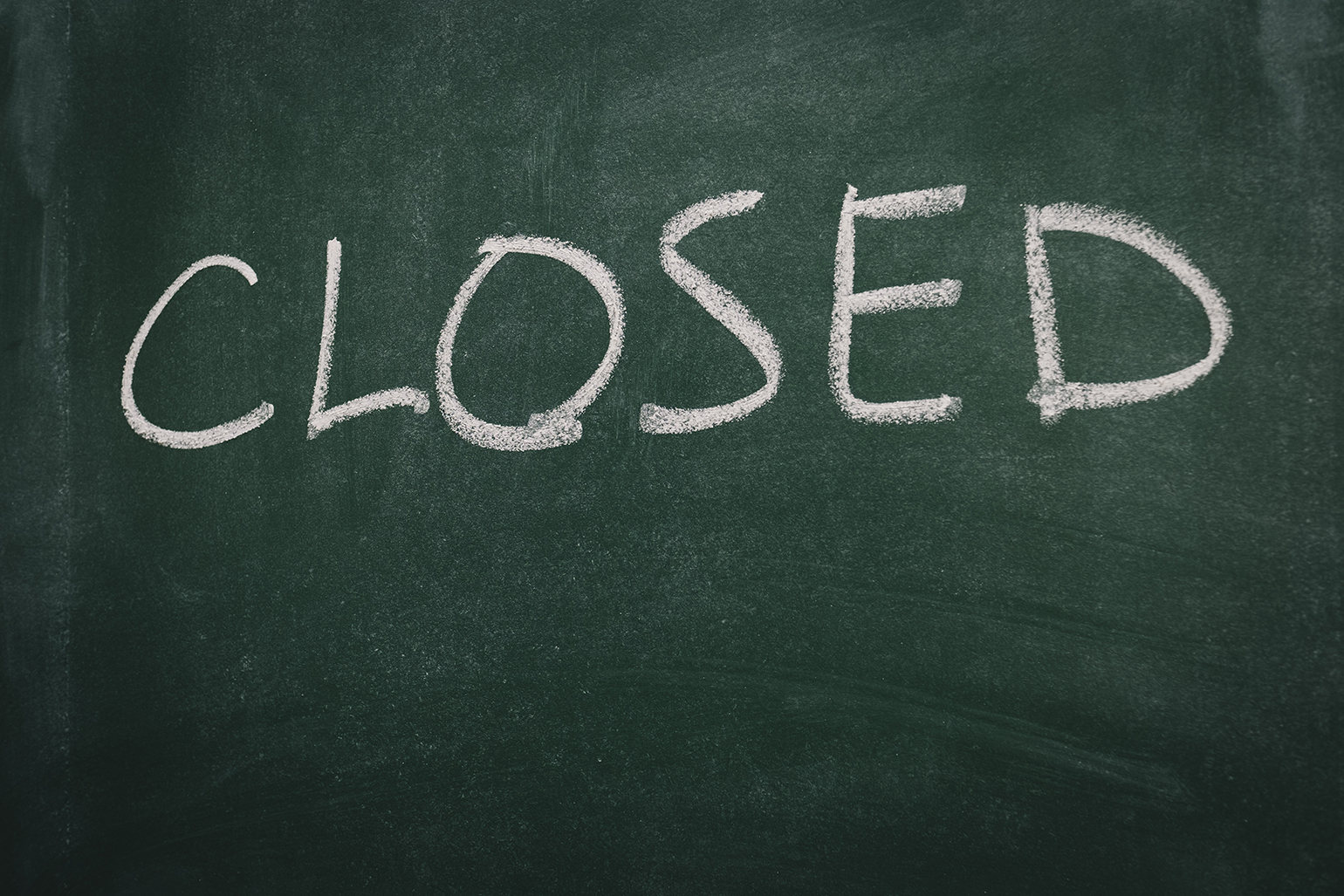 closed sign on chalkboard