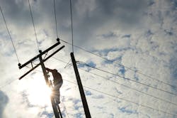 Lineman repairing powerline Lineman repairing powerline