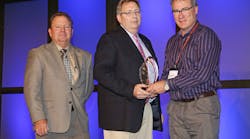 Chris Cumpton, president of Integrity Electrical Solutions, receives the IEC CNA Safety Award