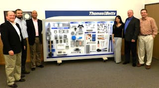 Newly announced Platinum Level Industry Partner Thomas &amp; Betts presented its generous donation of an electrical product display board to be used as a teaching tool by IECRM&rsquo;s electrical apprenticeship program instructors.