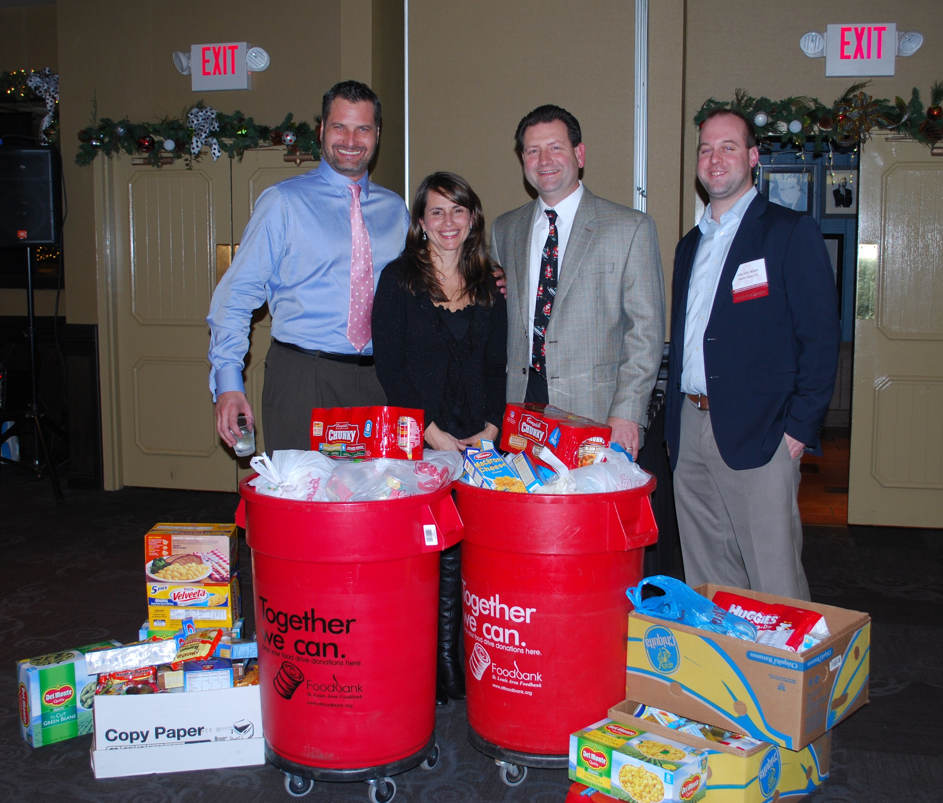 Robert Trask secretary Susan Winkelmann executive director Steve Giacin president and Vince Irwin VP helped collect 400 pounds of food on behalf of ASAMidwest for a St Louis food bank