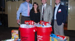 Robert Trask, secretary; Susan Winkelmann, executive director; Steve Giacin, president; and Vince Irwin, VP, helped collect 400 pounds of food on behalf of ASA-Midwest for a St. Louis food bank.