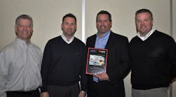 Construction Risk Solutions, a risk management and brokerage firm, presented Nickle Electrical with a congratulatory plaque for working four years and 1.25 million man-hours without a lost-time accident. Pictured left-right: CRS Senior Client Manager Luke Bien, CRS Account Executive Jeff Rees, Nickle President/CEO Steve Dignan, and CRS Director of Safety Bob Hegburg.