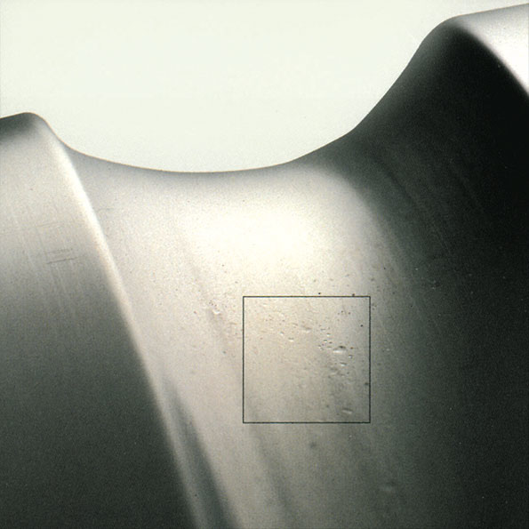 Bearing fluting due to shaft currents top and grease contamination bottom