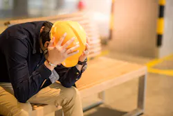 overworked engineer Zephyr18 iStock Getty Images Plus 957669660
