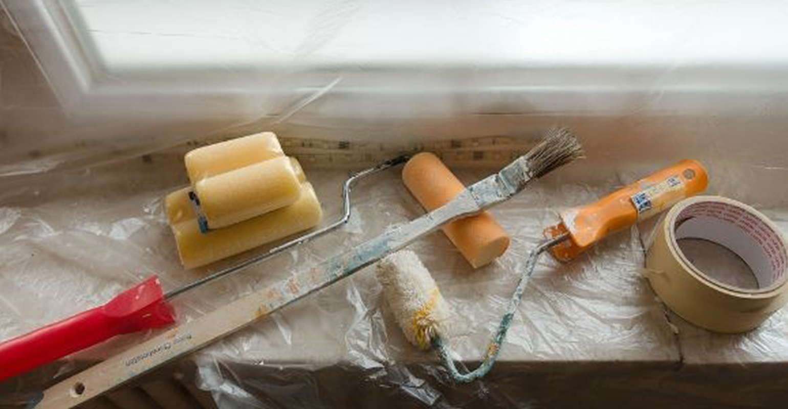 residential remodeling paint roller tape tarp.jpg