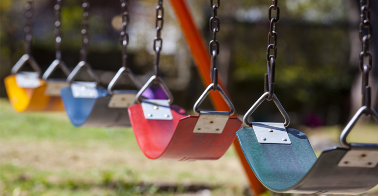 Colorful park swings.