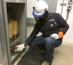 Meeting NFPA 70E’s condition of maintenance standards, this technician is performing arc flash study data collection. Meeting NFPA 70E’s condition of maintenance standards, this technician is performing arc flash study data collection.