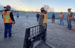 Workers with Hawkins Construction Co., Omaha, Neb., participate in a corona virus-focused safety stand down organized by the AGC. Workers with Hawkins Construction Co., Omaha, Neb., participate in a corona virus-focused safety stand down organized by the AGC.