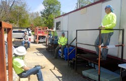 Construction workers practice social distancing at a break on a job site on April 9, 2020. Construction workers practice social distancing at a break on a job site on April 9, 2020.