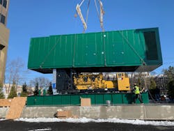 Workers complete the siting of a generator at a 5MW New Jersey critical operations data center for which Triad Consulting Engineers helped design a backup power system.