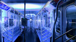 A New York City Metro Transit Authority subway car is bathed in germ-killing ultraviolet light emitted from portable and pole-based fixtures.