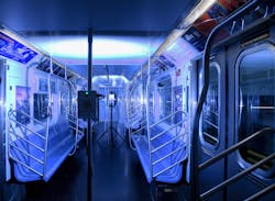 A New York City Metro Transit Authority subway car is bathed in germ-killing ultraviolet light emitted from portable and pole-based fixtures. A New York City Metro Transit Authority subway car is bathed in germ-killing ultraviolet light emitted from portable and pole-based fixtures.