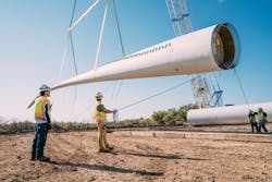 While the Horse Heaven Wind Farm is still under development, Scout recently completed work on the Heart of Texas Wind Farm in May 2020. Workers are shown positioning a blade for a wind turbine on the project.