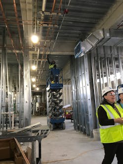 Photo 2. Ensuring safety protocols are being followed is an integral step in effective project management. Photo 2. Ensuring safety protocols are being followed is an integral step in effective project management.