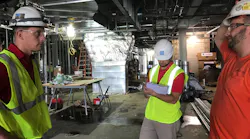 Photo 1. Collecting data through the job-site visit checklist with the foremen on-site.