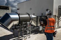 A Power Design superintendent uses the camera on a tablet to document and update his project manager on a recently installed safety switch. A Power Design superintendent uses the camera on a tablet to document and update his project manager on a recently installed safety switch.