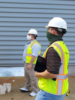 Dewberry personnel go over observations and discrepancies noted on an electrician's field report with the general contractor. Dewberry personnel go over observations and discrepancies noted on an electrician's field report with the general contractor.