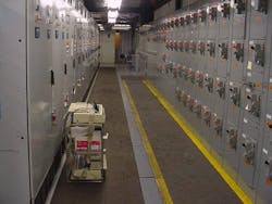 Photo 2. Energized electrical equipment in a guarded condition. This equipment is also subject to being in a &ldquo;lookalike&rdquo; condition.
