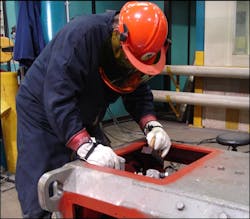 Photo 5. Testing a motor in the field. Note the qualified person is wearing all required arc-rated and shock clothing and PPE. Photo 5. Testing a motor in the field. Note the qualified person is wearing all required arc-rated and shock clothing and PPE.