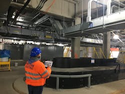 A Five Star Electric project manager compares the BIM model to physical installation at the Newark Airport Terminal One project. A Five Star Electric project manager compares the BIM model to physical installation at the Newark Airport Terminal One project.