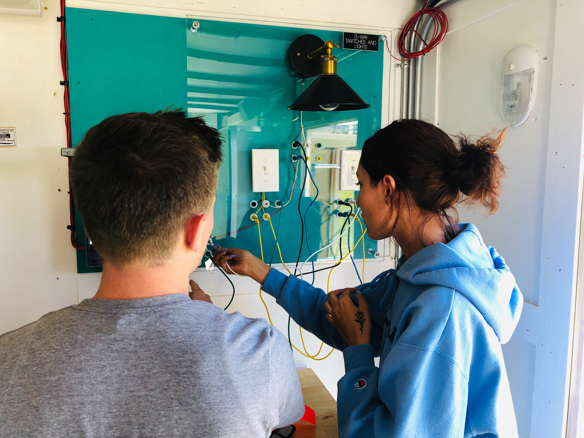 Encore Electric&rsquo;s electrical career outreach on wheels &ndash; a &ldquo;mobile escape room&rdquo; &ndash; incorporates interactive components like a three-way switch wiring mock up.