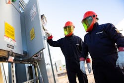 Equipment inspection at a microgrid test bed operated by the Laboratory for Energy and Power Solutions at Arizona State University in Tempe, Ariz. Equipment inspection at a microgrid test bed operated by the Laboratory for Energy and Power Solutions at Arizona State University in Tempe, Ariz.