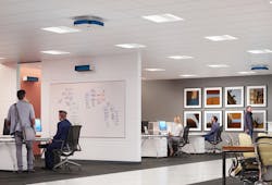 Photo 1. This office space uses two types of upper air GUV luminaires. The ceiling-mounted and wall-mounted units are located well above a 7-ft height for safety. Source: Cooper Lighting