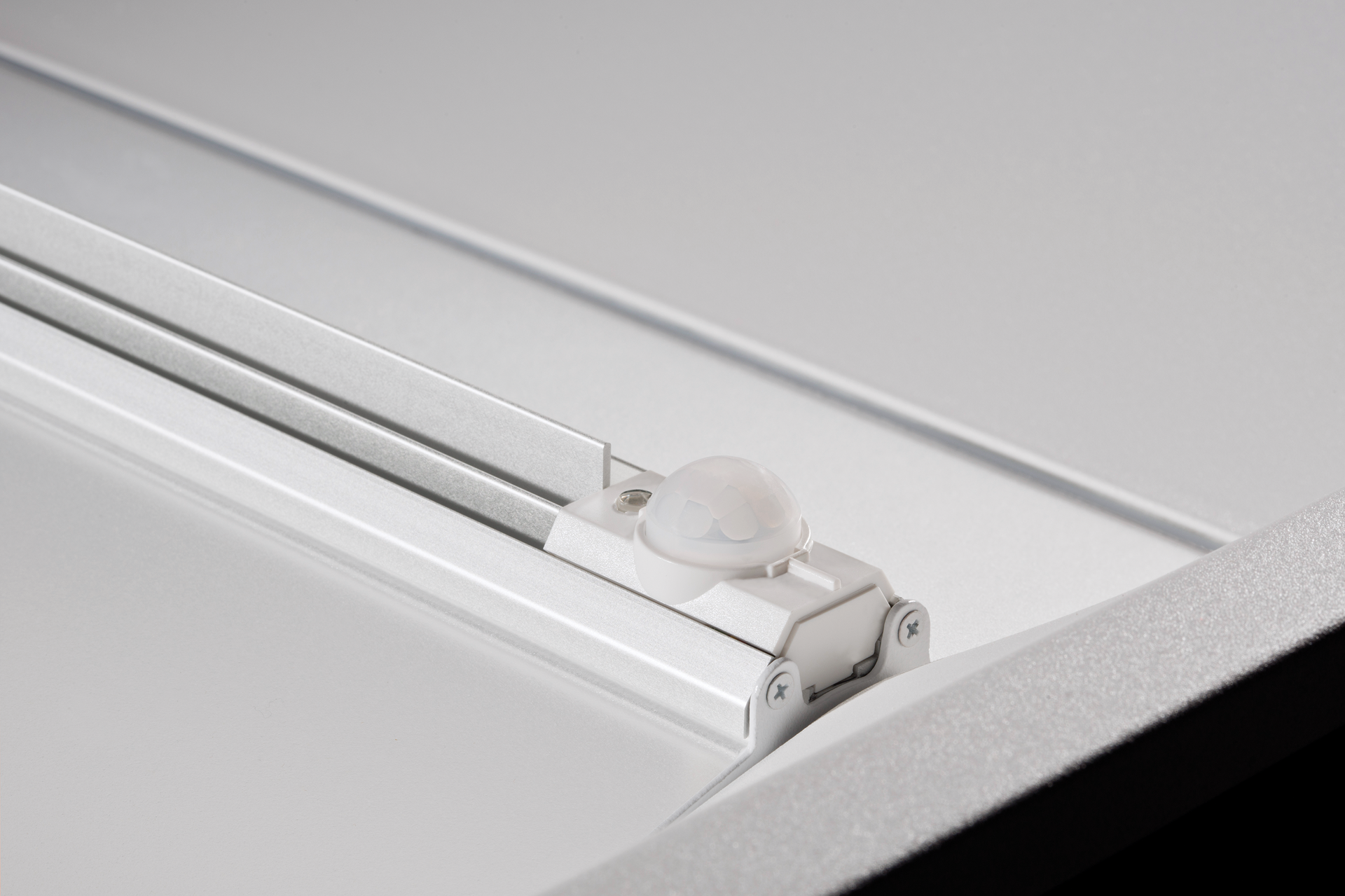 Luminaire level lighting controls technology is a subset of networked lighting controls that includes factory-integrated sensors in each luminaire. These sensors provide occupancy and daylight sensing and wireless, two-way digital communication with other luminaires in the space, or broader connectivity via a gateway and the internet to unite remote spaces.