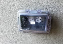 Photo 2. A weather-resistant (WR) receptacle located in a wet location based on the protection afforded by the in-use extra-duty cover. Photo 2. A weather-resistant (WR) receptacle located in a wet location based on the protection afforded by the in-use extra-duty cover.