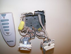 Photo 9. At least the installer used a box here! Nice job with the grounding as well.
